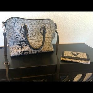 Black floral detail guess purse and wallet
